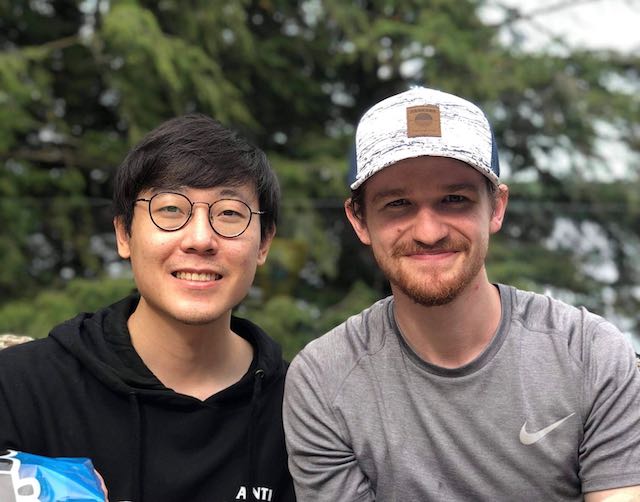 Javelin Sports founders Coleman and Justin sitting next to each other.